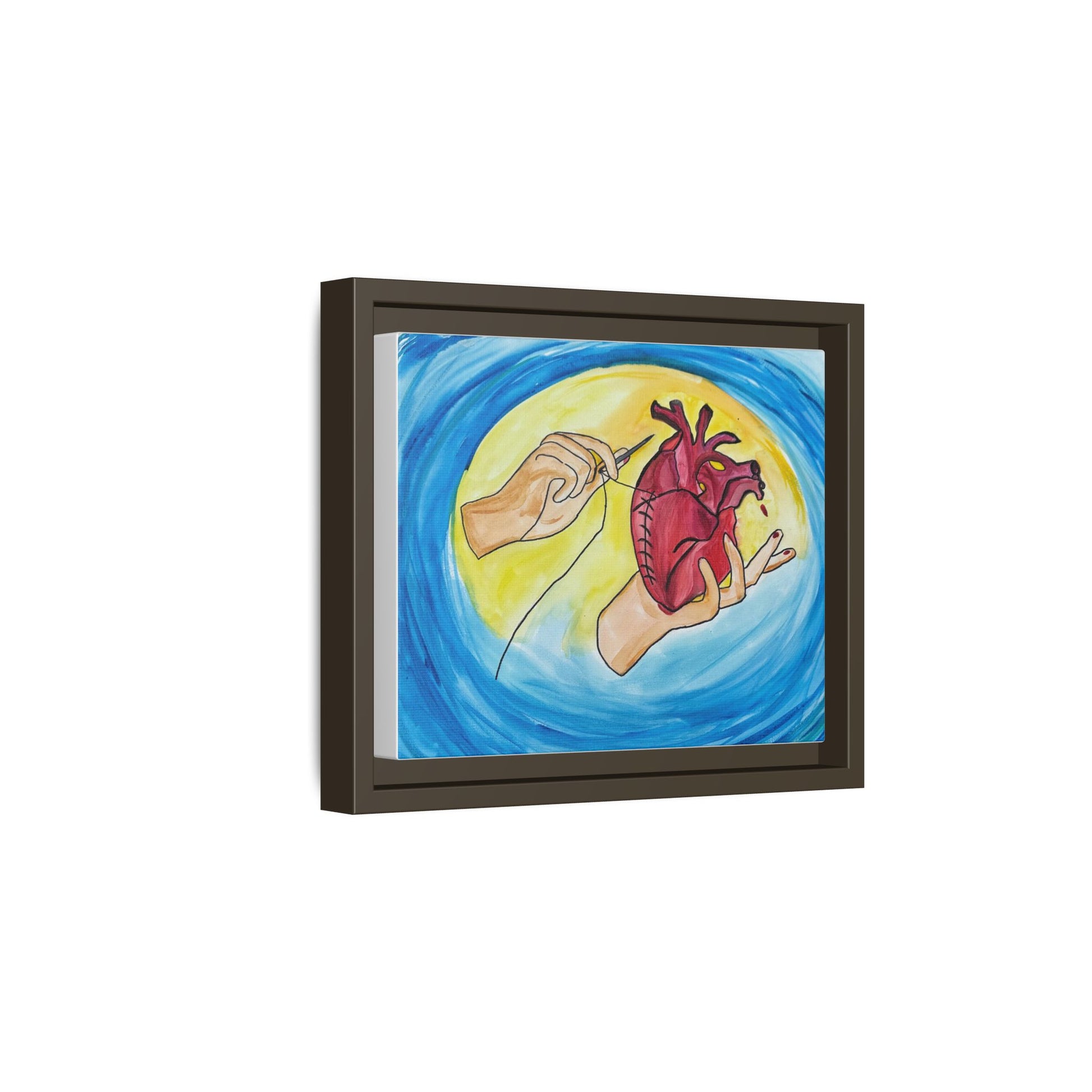 Mending Heart framed matte canvas — angled view