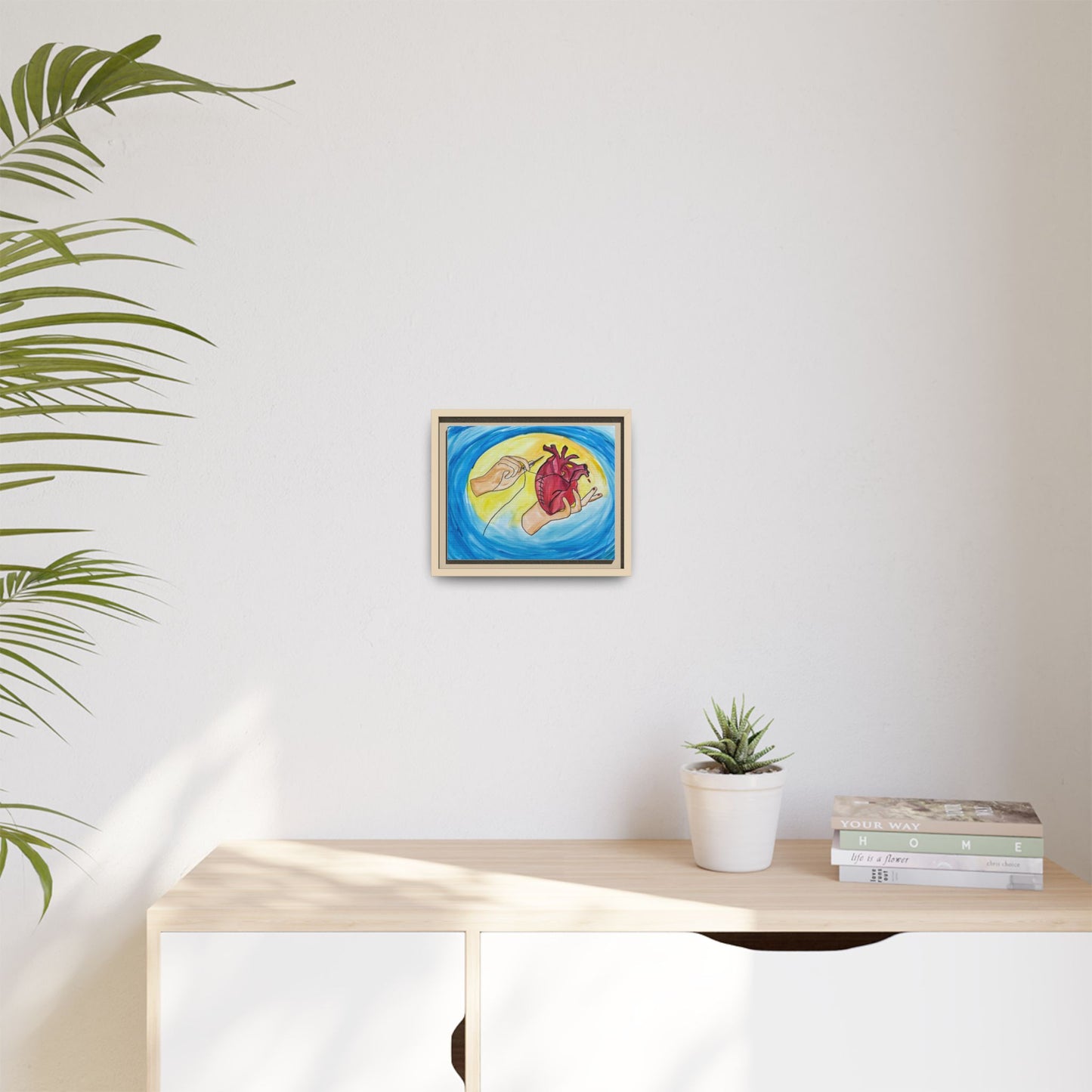 Mending Heart hand-stitched heart art — room mockup