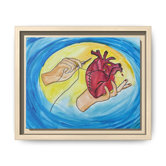 Mending Heart framed canvas — hands stitching an anatomical heart, natural pine frame
