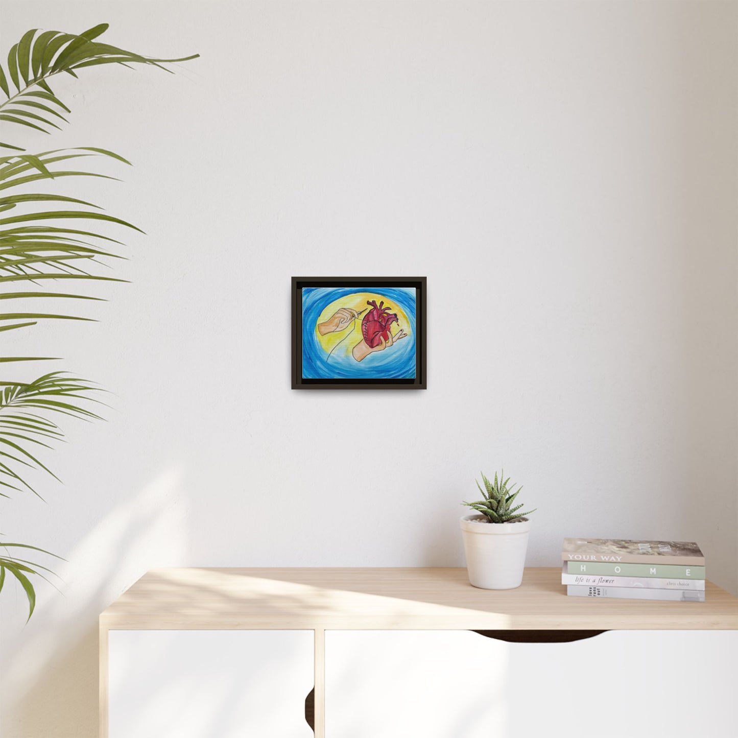 Mending Heart hand-stitched heart framed canvas — side profile